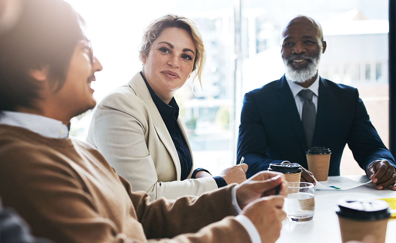 Consultants discussing business Consultants discussing business