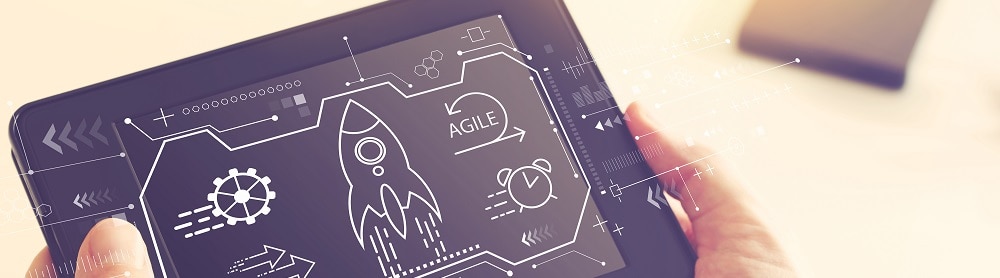 agile-maturity-blog-mobile looking at an old tablet that says agility