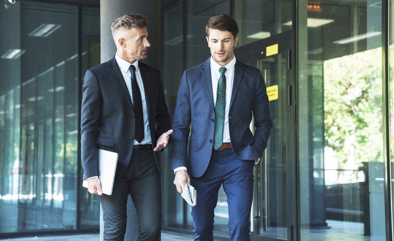 cio-advisory-two-consultants-walking-discussing CIO advisory two consultants walking