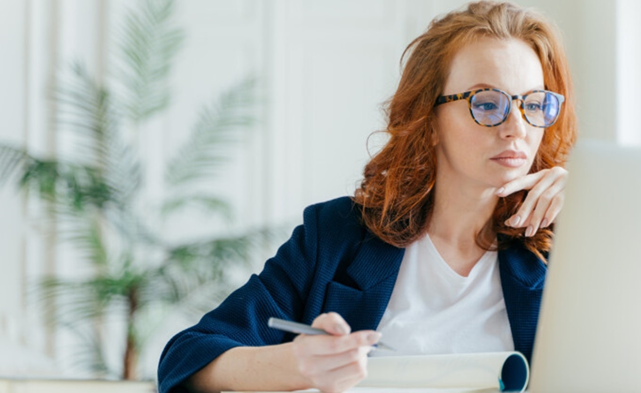 Consultant working on a laptop Consultant working on a laptop