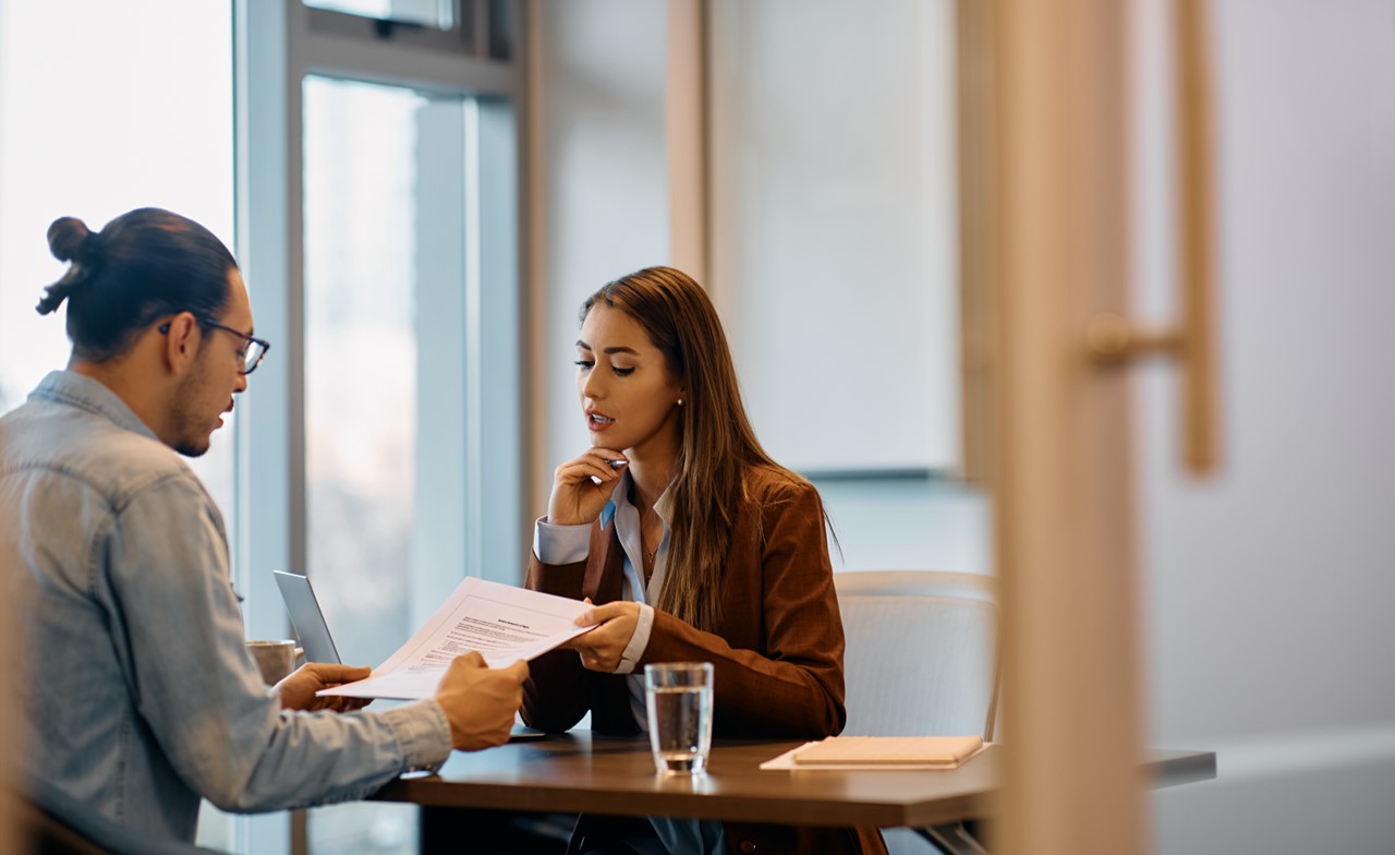 Consultant talking to customer