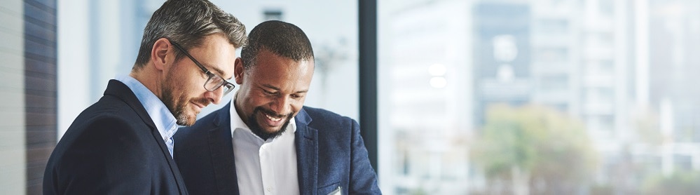 Consultants discussing cloud-proven payments solution Consultants discussing cloud-proven payments solution