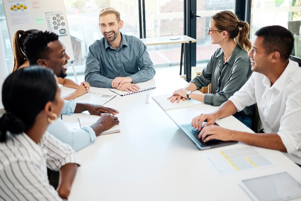 Diverse group of colleagues talking 