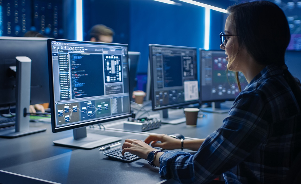 Consultants working on desktop computers Consultants working on desktop computers