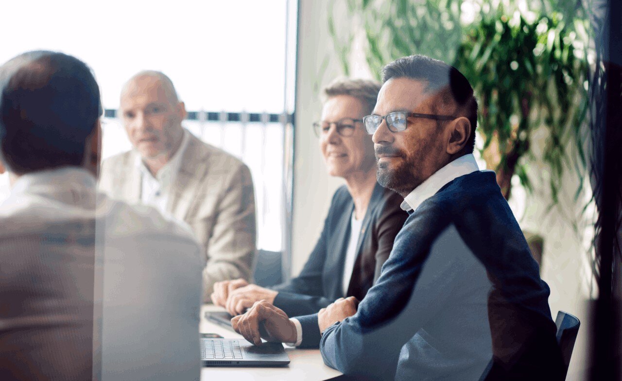 Members in meeting Members in meeting