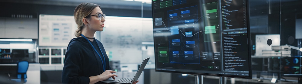 AI developer using Artificial Intelligence software on a computer AI developer using Artificial Intelligence software on a computer