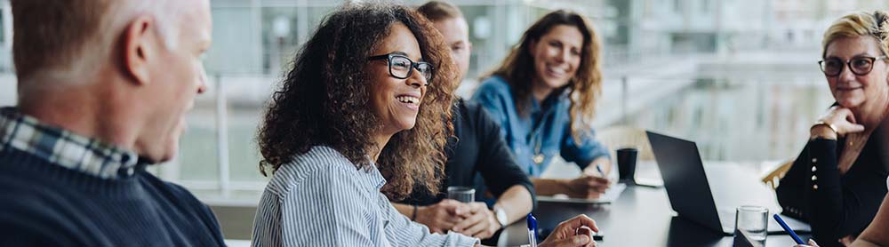 Colleagues discussing business solutions Colleagues discussing business solutions