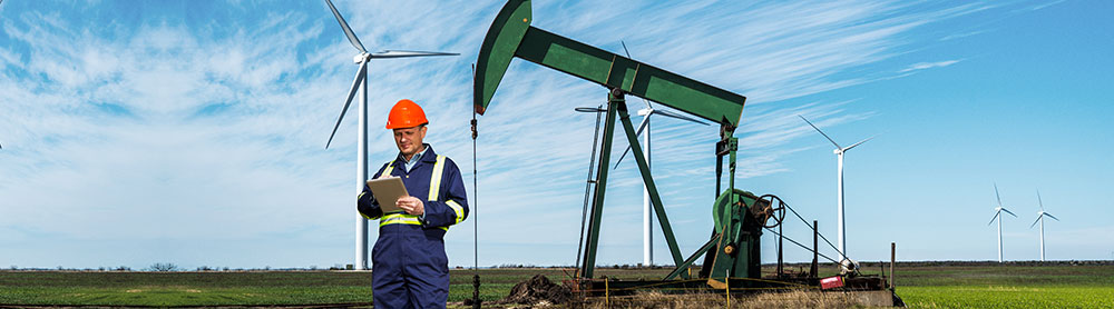 Man with tab - Oil and gas