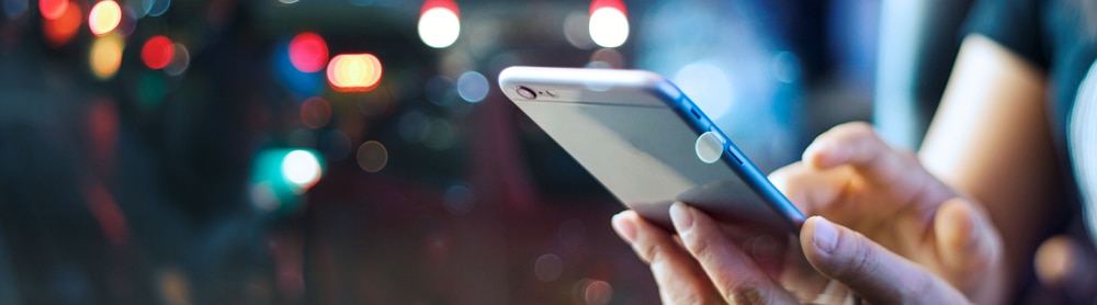 Hands holding a mobile phone Hands holding a mobile phone