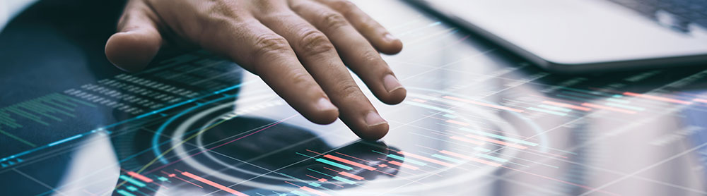 Person’s hand touching a digital device Person’s hand touching a digital device