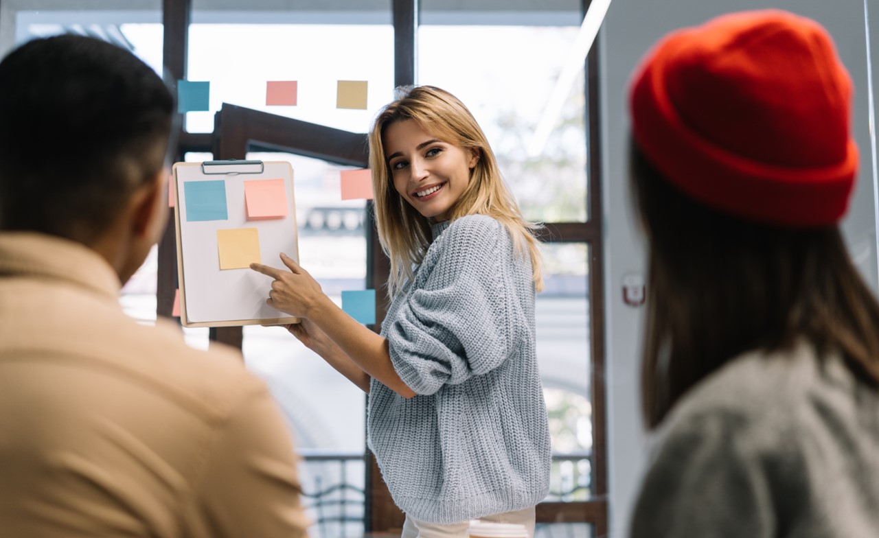 Team discussing a project together Team discussing a project together