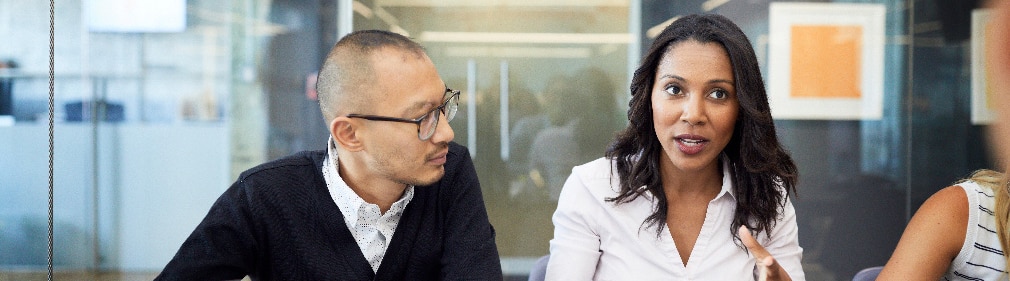 Consultants discussing assessment results Consultants discussing assessment results