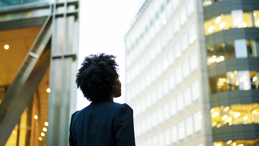 person looking at a building