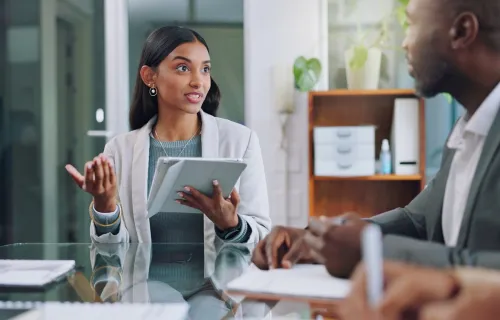 Business woman brainstorming with colleague