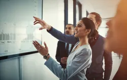 consultants looking at dashboard