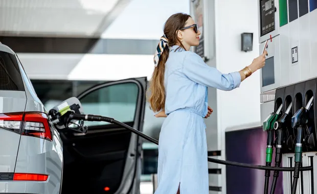 person at petrol pump