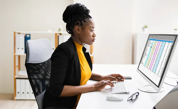 women working to implement implement enterprise financial system