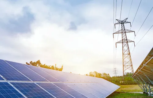 solar panels and electricity tower