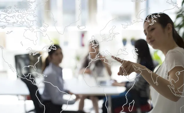 engineers discussing locations on a map