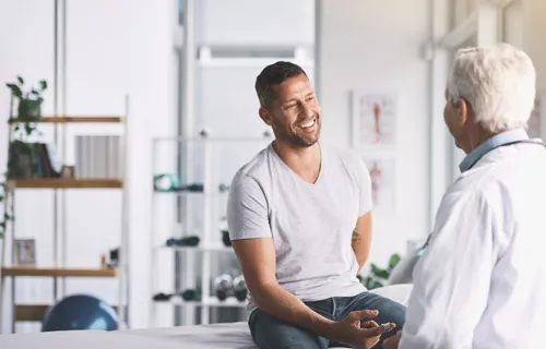 patient speaking with clinician patient speaking with clinician